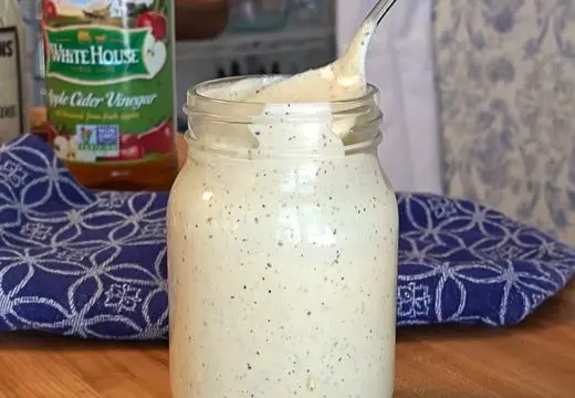 Transferring White BBQ Sauce to Storage Jar